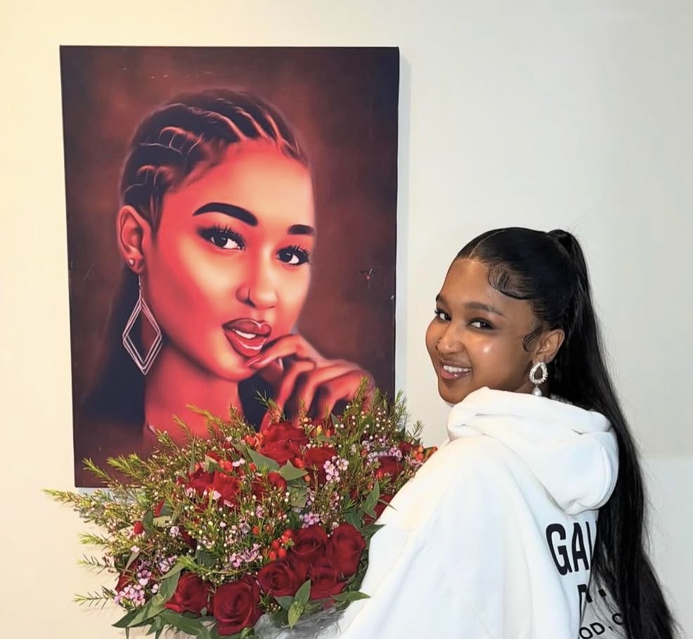 A Red Ink Media Store customer displaying personalised artwork